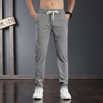Дышащие шелковые мужские модные брюки Брюки Легкие Летние Новые Корейские 2023 Ice Style Молодого бренда с эластичной талией Тонкие